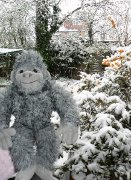 Yeti enjoys early April snow showers.