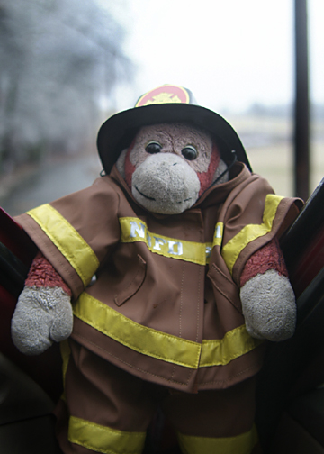 Squirt as fireman in ice storm.