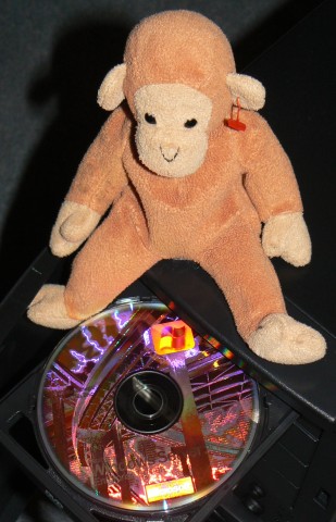 Little Bongo loads a software CD into the new PC.