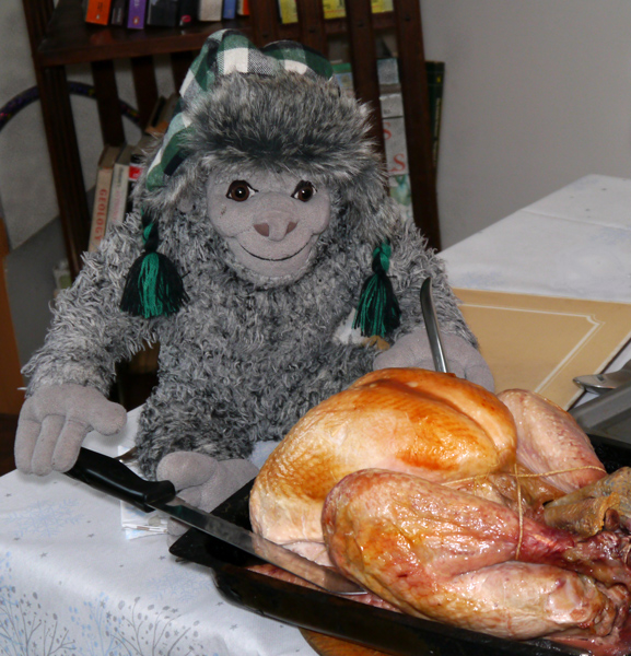 Yeti gets to carve the turkey