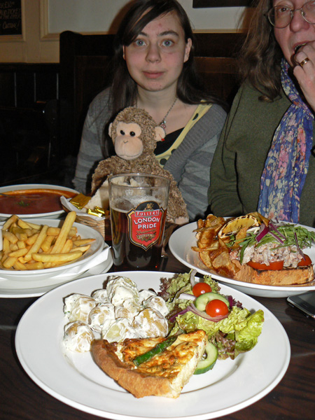 Bonsai monkey with food and beer at The Bridge Tavern, Portsmouth.