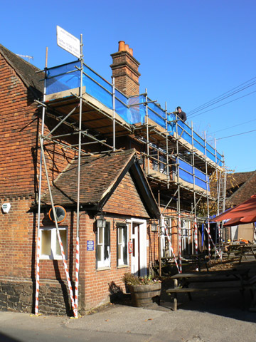 Scaffolding around the pub.