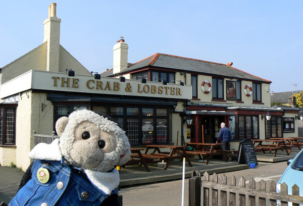 Mooch monkey outside the Crab and Lobster Inn, Bembridge, Isle of Wight.