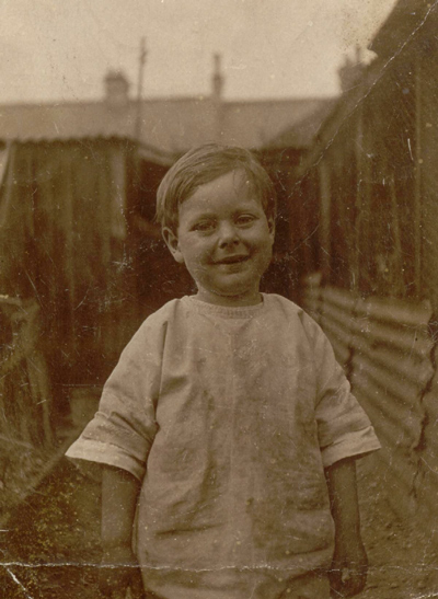 Bob beside the chicken run at 22 Lowestoft Road, Watford.