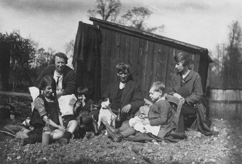 Bob's cousin Joyce, aunt Win, cousin Vera, Pip the dog, uncle Alf, Bob and Mum at the Harebrakes allotment.