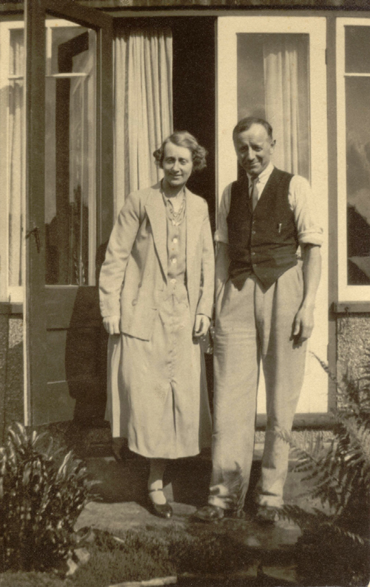 Bob's Mum and Dad, c1934, by the French windows at 74 Bushey Mill Crescent.