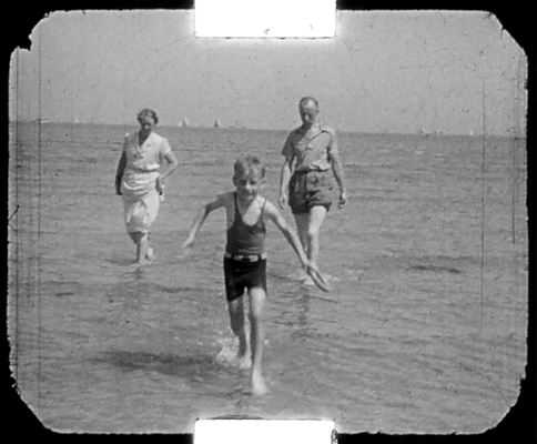 Bob's Mum, brother Dennis and Dad paddling in the sea at the Isle of Wight, c1938.