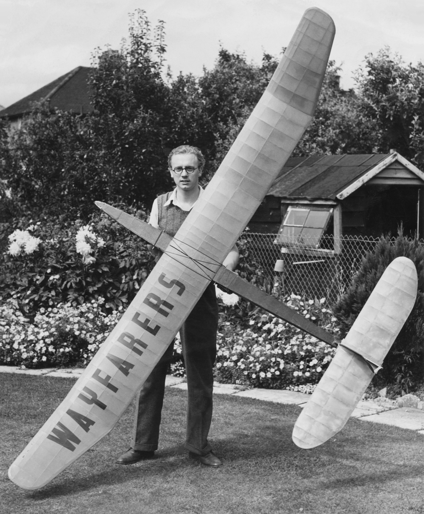 Dennis with a 10 foot sailplane. 1949.