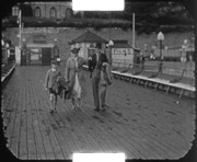 Dennis, Mum and Dad on a pier, Isle of Wight, c1938.