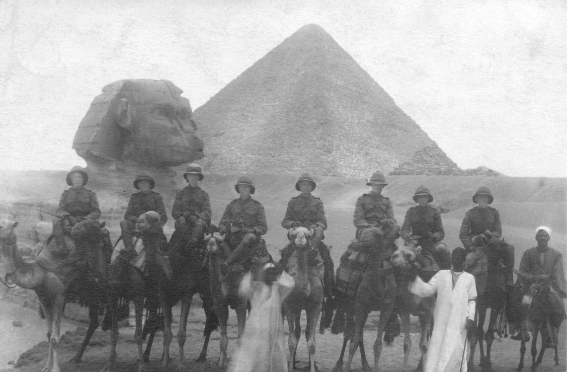 Lewis Jones riding a camel at the Pyramids during WW1.