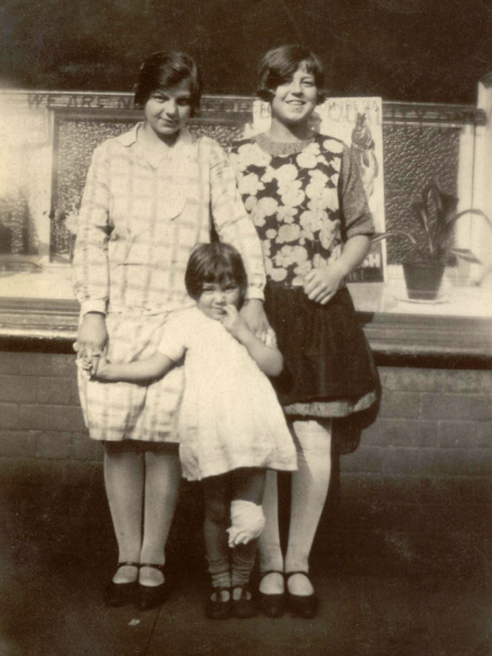 Edna, Una and Eva outside the fish and chip shop.