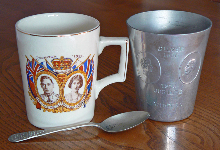 The mug and teaspoon from the Coronation of King George VI and the aluminium beaker from the Silver Jubilee.