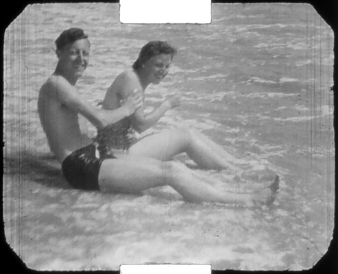 Bob and Una in the surf on a beach, Isle of Wight. 1947.
