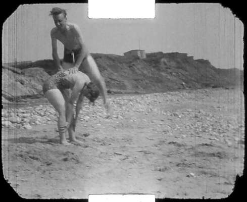 Una and Dennis on a beach, Isle of Wight. 1947.