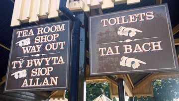 Welsh & English language at a railway station.