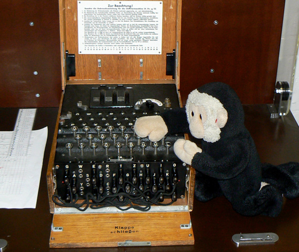 Mooch monkey with an Enigma machine.