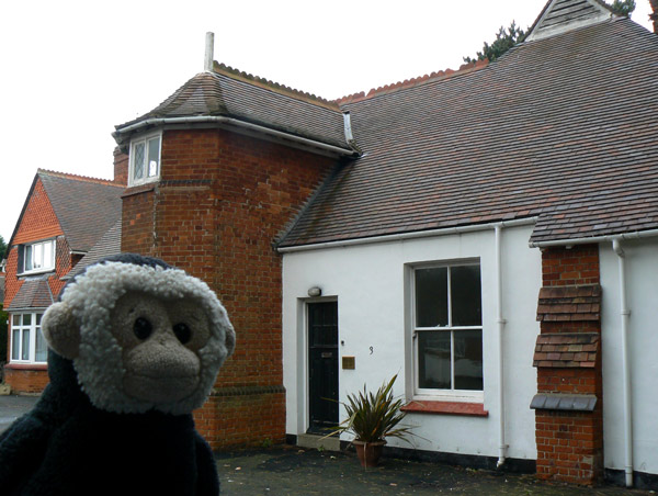 Mooch monkey outside one of the houses in the Bletchley Park mansion courtyard.