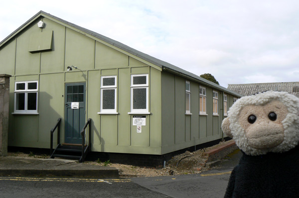 Mooch monkey outside Hut 8 at Bletchley Park .