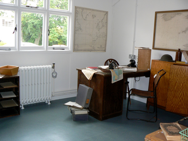 A reconstruction of Alan Turings office in Hut 8 at Bletchley Park .