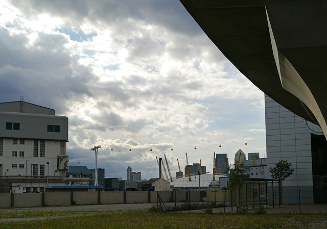 Mooch monkey uses the TfL Emirates Air Line cable car - seen from Silvertown