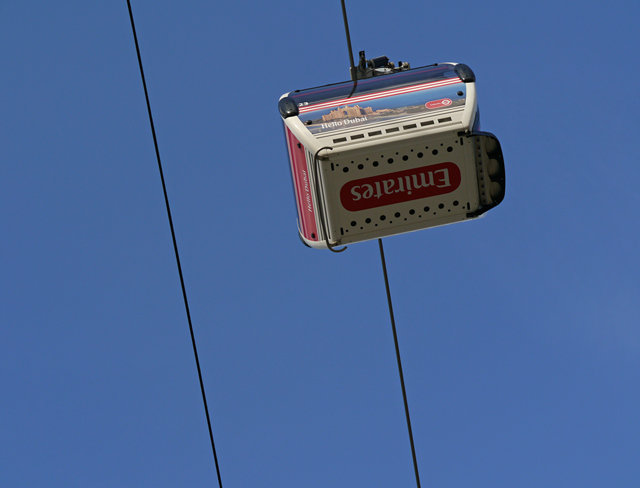 Mooch monkey uses the TfL Emirates Air Line cable car - seen from below