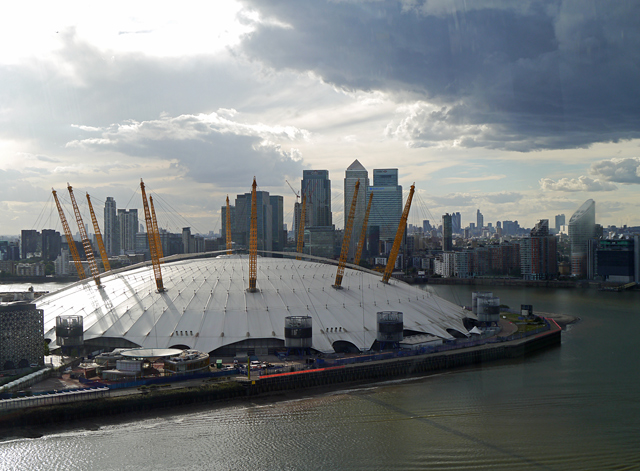 Mooch monkey uses the TfL Emirates Air Line cable car - looking west towards the O2 Dome, Docklands and the City of London