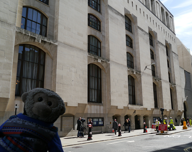 Mooch monkey outside the new part of the Old Bailey building