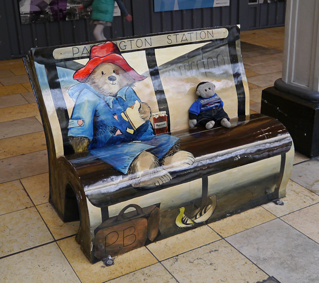 Paddington Bear book bench at Paddington Station with Mooch monkey