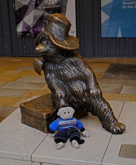 Paddington Bear statue at Paddington Station with Mooch monkey