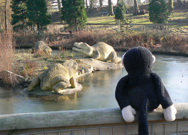 Mooch monkey meets some dinosaurs in Crystal Palace Park.