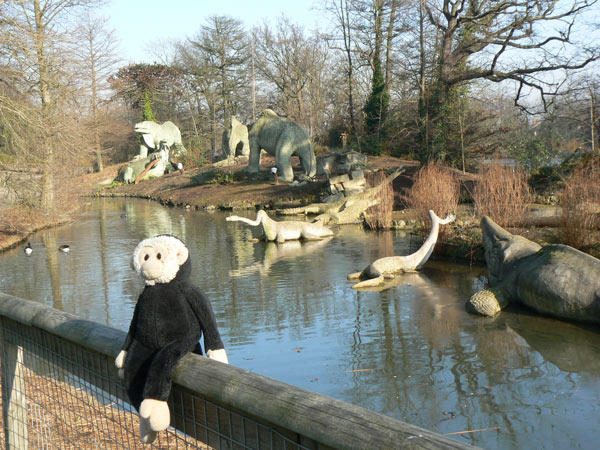 Mooch monkey meets some dinosaurs in Crystal Palace Park.