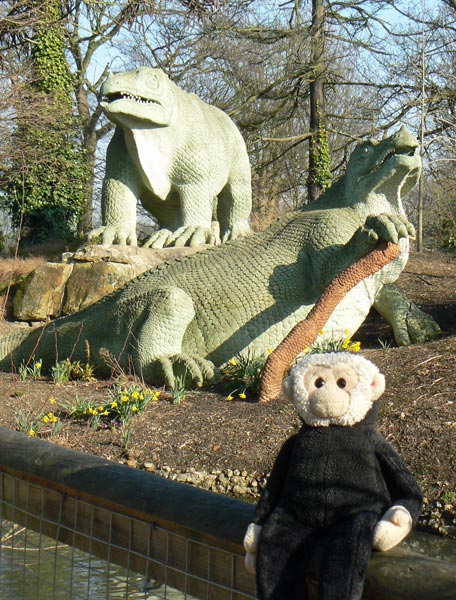 Mooch monkey meets some dinosaurs in Crystal Palace Park.