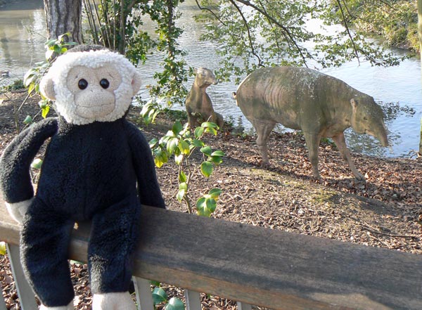 Mooch monkey meets some prehistoric animals in Crystal Palace Park.