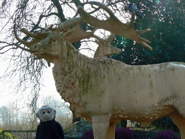 Mooch monkey meets some prehistoric animals in Crystal Palace Park.