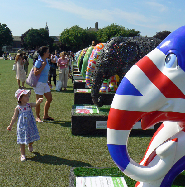 Mooch monkey looks for Elephant Parade 2010 elephants.