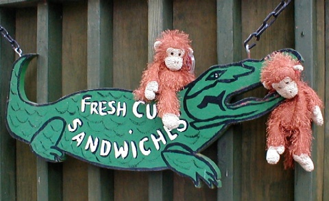 The cafe signs feature an alligator