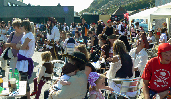 A happy pirate crowd in Hastings.