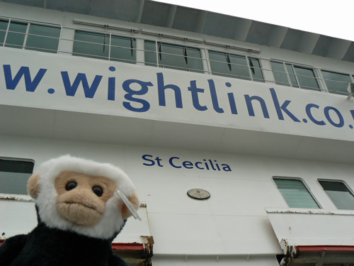 Mina monkey below a Wightlink name sign.