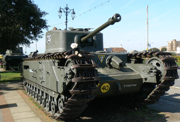 Monty Mooch monkey sits on a tank at the D-Day exhibition, Southsea Common.