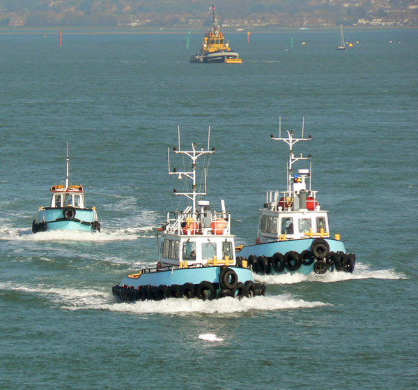 Tugs on the move in Portsmouth harbour.