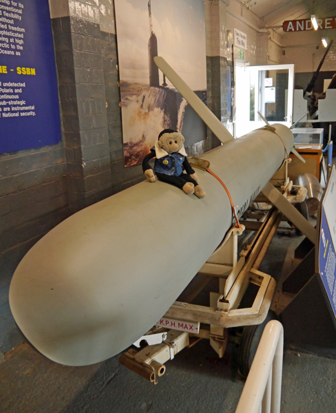 Mooch monkey on a Tomahawk cruise missile at the Submarine Museum.