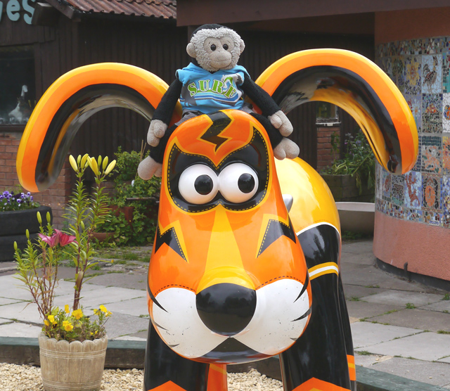 Mooch monkey sits on a Gromit at Gromit Unleashed in Bristol 2013
