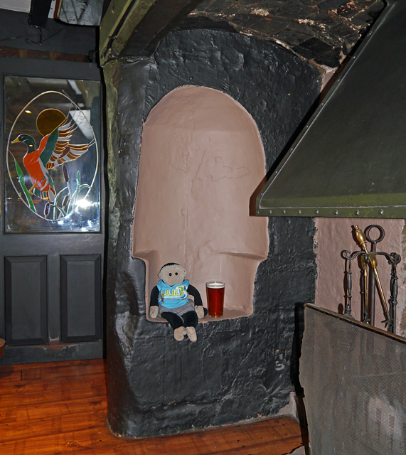 Mooch monkey in Kynaston's seat at the Old Three Pigeons, Nesscliffe