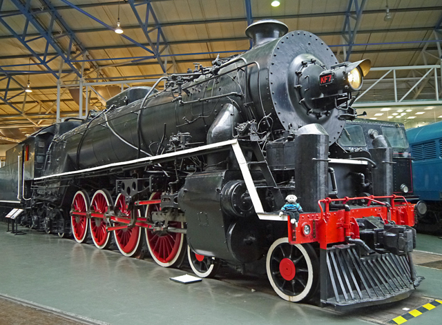 Mooch monkey on a giant Chinese engine at the Railway Museum in York