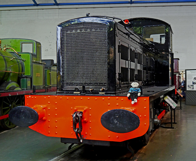 Mooch monkey on an engine at the National Railway Museum in York