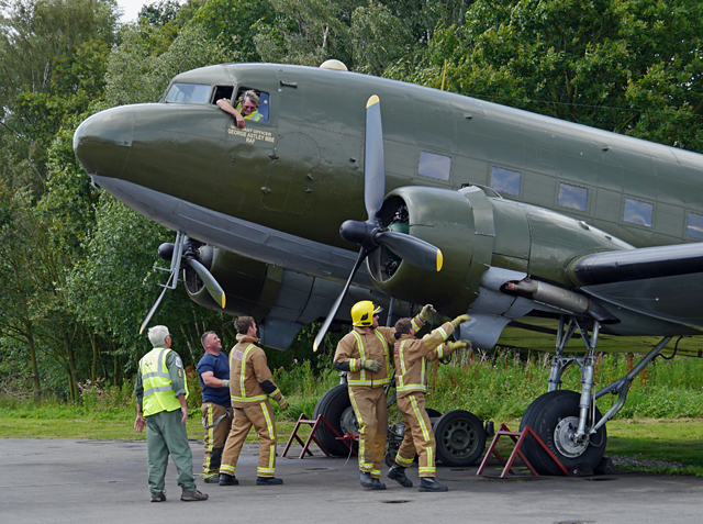 Mooch monkey at Yorkshire Air Museum, Elvington - Fire Service helps prepare the Dakota DC3