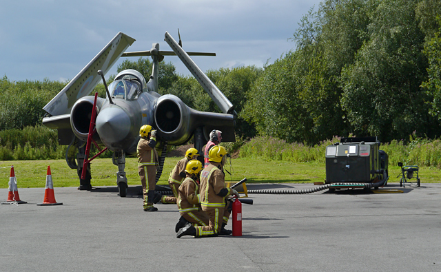 Mooch monkey at Yorkshire Air Museum, Elvington - the Fire Service watches the Dakota DC3 run its engines