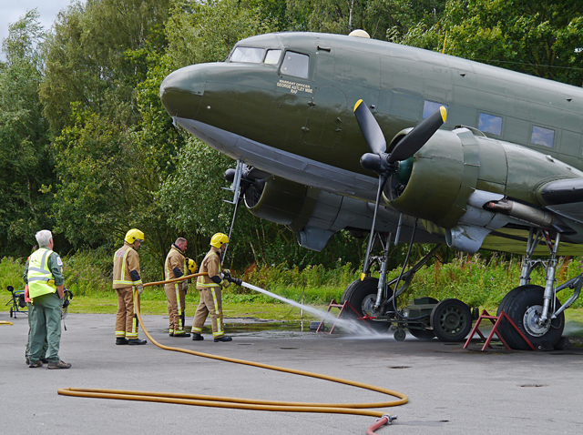 Mooch monkey at Yorkshire Air Museum, Elvington - the Fire Service cleans up after the Dakota DC3 engine runs